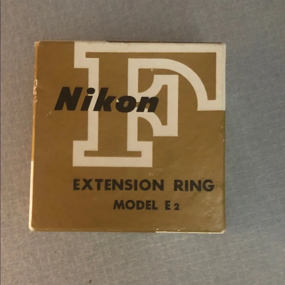 Nikon Extension Ring Box in Gold and White